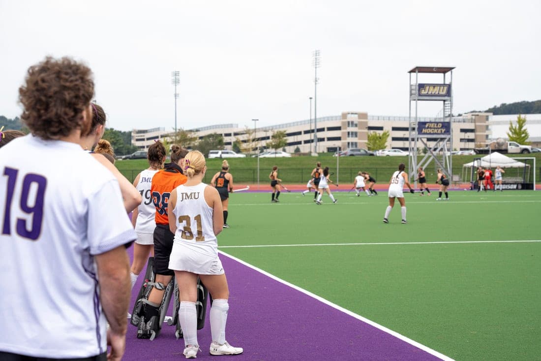 Players on the sideline during a game